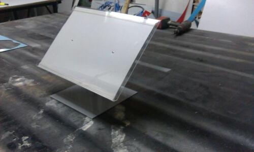 sy - AN INFORMATION DESK STANDS